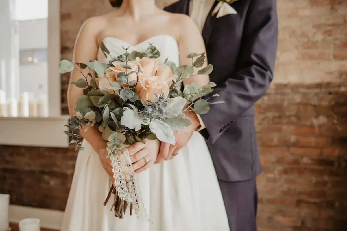 Adelphia Restaurant & Events — wedding couple and flowers