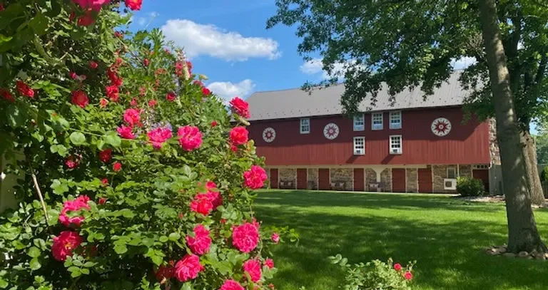 Fox Rose Farm — red barn exterior and roses