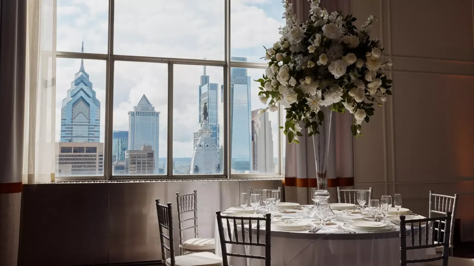 Loews Philadelphia Hotel — reception beside skyline windows