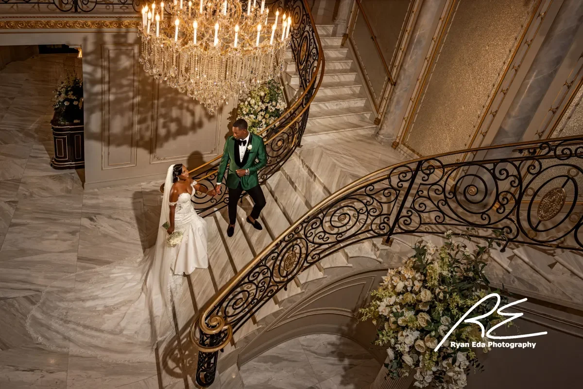 Lucien’s Manor — couple on the staircase