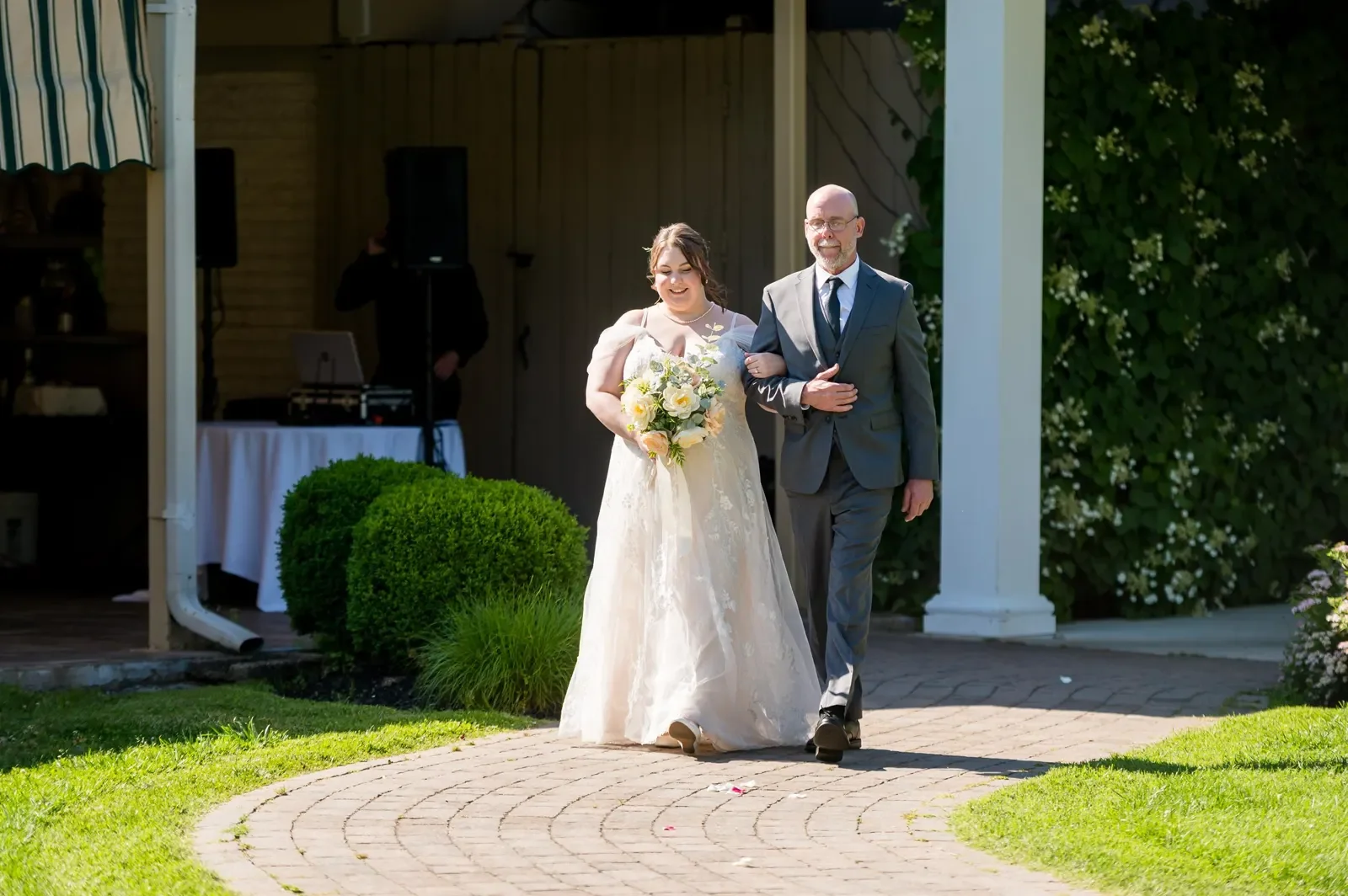 Medford Village Country Club — couple by the clubhouse entrance