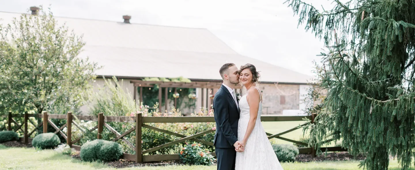 Stone Spring Farms — couple outside the barn