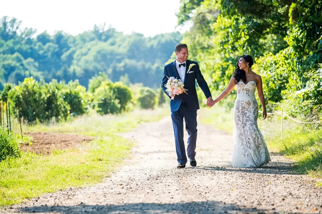 The Inn at Fernbrook Farms — couple on a farm path