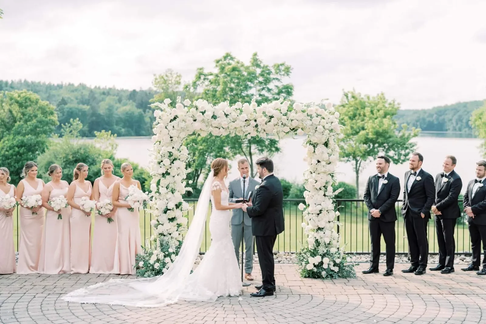 The Lake House Inn — lakefront garden ceremony setting