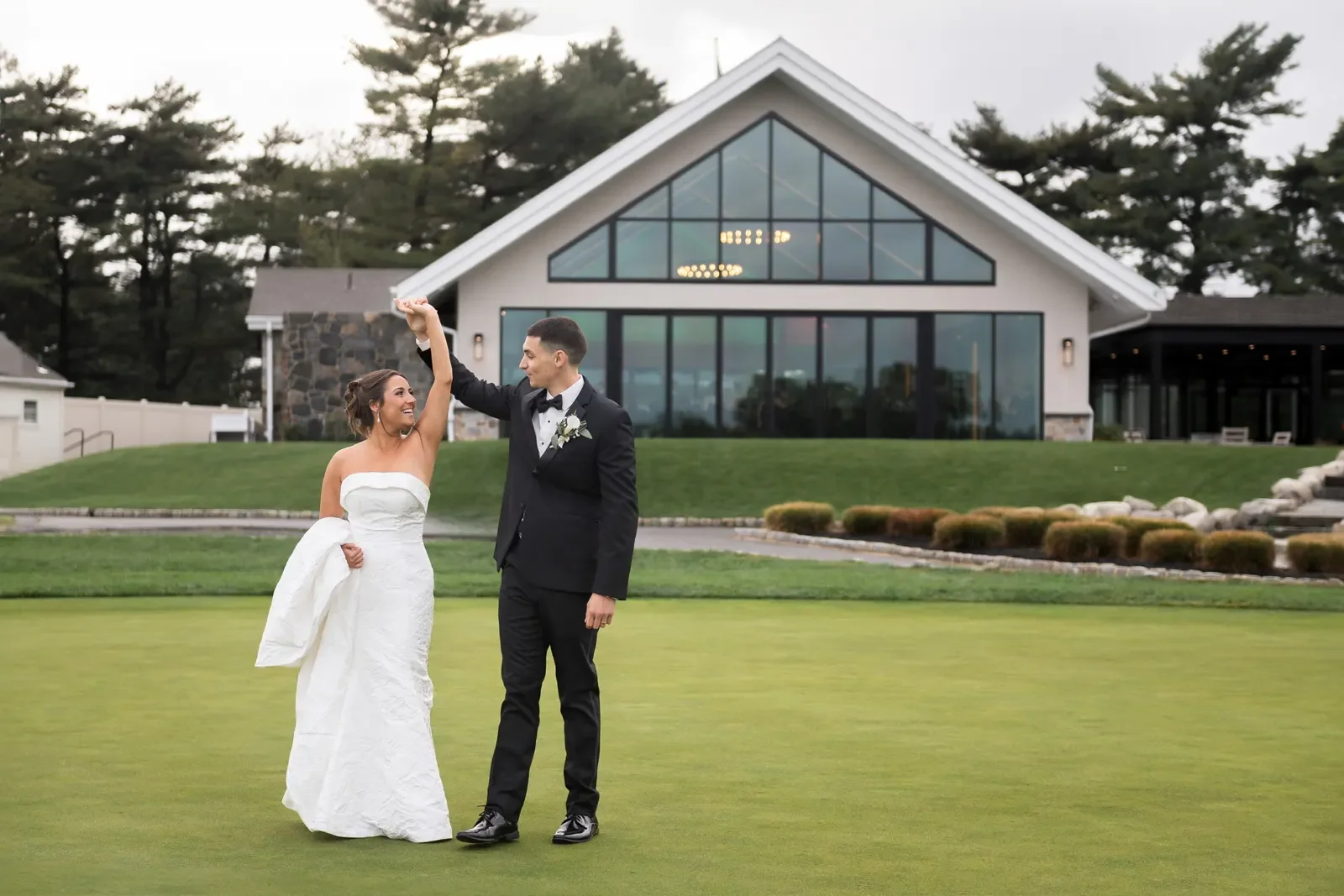 The Legacy Club at Woodcrest — couple outside the clubhouse