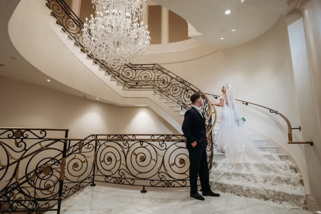 The Mansion on Main Street — curved interior staircase