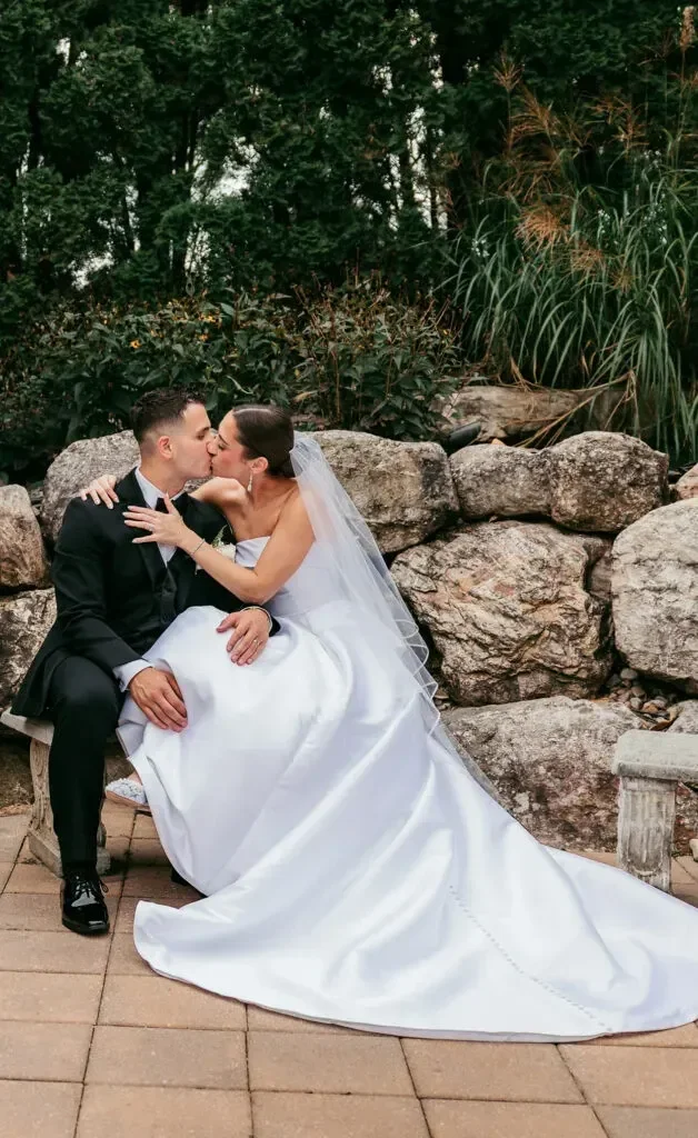 The Merion — couple in the garden