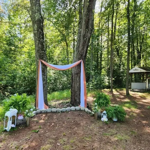 Winding Woods Venue — forest ceremony arbor